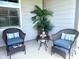 Cozy patio with comfortable seating, decorative plant and lighting at 17324 Americana Crossing Xing, Noblesville, IN 46060
