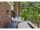 Spacious back deck with outdoor seating, perfect for entertaining while enjoying the view of the wooded yard at 2034 Dynasty Ridge Rd, Martinsville, IN 46151