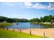 Sandy beach with a lake view and lush green surroundings at 2034 Dynasty Ridge Rd, Martinsville, IN 46151