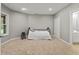 Finished basement bedroom with neutral walls and carpet flooring, complete with egress window at 2034 Dynasty Ridge Rd, Martinsville, IN 46151