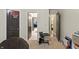 Neutral bedroom with a doorway. A basketball hoop is on the door with an activity center nearby at 2034 Dynasty Ridge Rd, Martinsville, IN 46151