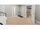 Finished basement with bedroom, bathroom, and doorway leading to another room with a treadmill at 2034 Dynasty Ridge Rd, Martinsville, IN 46151
