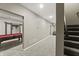 Finished basement hallway leading to various rooms, with a carpeted staircase visible at 2034 Dynasty Ridge Rd, Martinsville, IN 46151