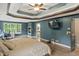 Spacious main bedroom suite features a tray ceiling, and an en-suite bathroom with a fireplace at 2034 Dynasty Ridge Rd, Martinsville, IN 46151