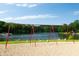 Well-maintained swing set with a lake view and lush green surroundings at 2034 Dynasty Ridge Rd, Martinsville, IN 46151