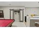 Finished basement features a pool table, wet bar with granite countertop, and wine storage at 2034 Dynasty Ridge Rd, Martinsville, IN 46151