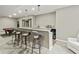 Finished basement featuring a wet bar with seating and modern pendant lighting at 2034 Dynasty Ridge Rd, Martinsville, IN 46151