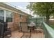 A deck with outdoor furniture and string lights at 2170 N Old State Road 9, Columbus, IN 47203