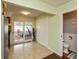 Spacious entryway with tile floors, closet, backyard access, and a half bathroom at 2170 N Old State Road 9, Columbus, IN 47203