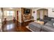 Spacious living area with hardwood floors, rustic wood accent wall, and comfortable seating at 2170 N Old State Road 9, Columbus, IN 47203