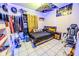 This bedroom has a bed, ceiling accents, tile flooring and a gaming chair at 2246 E Yellowwood Ln, Martinsville, IN 46151