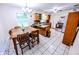 Spacious kitchen with a dining area, stainless appliances, and tile flooring at 2246 E Yellowwood Ln, Martinsville, IN 46151