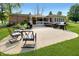 Spacious backyard with patio, outdoor seating, and multiple grills perfect for entertaining at 227 Vestal Rd, Plainfield, IN 46168