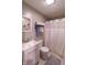 Clean bathroom featuring a single sink vanity, ceramic tile floor, and shower and bathtub combo at 227 Vestal Rd, Plainfield, IN 46168