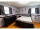 Cozy bedroom with ample storage, calming colors, and a relaxing ambiance at 227 Vestal Rd, Plainfield, IN 46168