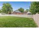 Large, well-maintained backyard featuring a lush lawn and a privacy fence at 253 W Westfield Blvd, Indianapolis, IN 46208