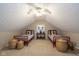 Charming bedroom with twin beds, baskets for storage, and natural light from a window at 253 W Westfield Blvd, Indianapolis, IN 46208