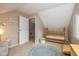 Cozy bedroom with light-filled room, wooden crib and playful decor at 253 W Westfield Blvd, Indianapolis, IN 46208