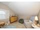 Adorable Bedroom with dresser, armchair, and plush rug with soft light and calming colors at 253 W Westfield Blvd, Indianapolis, IN 46208