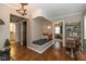 Stylish hallway with a cozy bench, hardwood floors, and access to multiple rooms at 253 W Westfield Blvd, Indianapolis, IN 46208