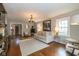 Spacious living room with hardwood floors, neutral decor, and an open layout at 253 W Westfield Blvd, Indianapolis, IN 46208