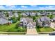 Stunning aerial view showcasing a well-maintained home in a vibrant neighborhood at 2715 Benmore Ct, Zionsville, IN 46077