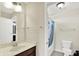 A view of a bathroom vanity plus the toilet and tub/shower behind a doorway at 2715 Benmore Ct, Zionsville, IN 46077