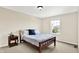 A traditional bedroom features carpet floors, side table and natural light at 2715 Benmore Ct, Zionsville, IN 46077