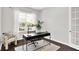 Bright office space with natural light, a modern desk, and a comfortable chair at 2715 Benmore Ct, Zionsville, IN 46077