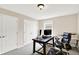 Functional home office setup with a spacious desk, comfortable chair, and ample natural light, ideal for productivity at 2715 Benmore Ct, Zionsville, IN 46077