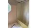Bathroom with vintage bathtub and vinyl flooring needing repairs and upgrades at 3042 S Conservation Club Rd, Morgantown, IN 46160