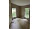 Bedroom with two windows providing natural light and wall to wall carpeting at 3042 S Conservation Club Rd, Morgantown, IN 46160