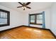 Bright bedroom with hardwood floors, generous windows, and neutral tones at 3246 N New Jersey St, Indianapolis, IN 46205