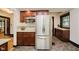 Updated kitchen with stainless steel appliances, dark cabinets, and tile backsplash at 3246 N New Jersey St, Indianapolis, IN 46205