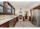 Spacious kitchen with stainless steel appliances, ample counter space, and tile flooring at 3246 N New Jersey St, Indianapolis, IN 46205
