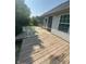 Back deck featuring a screen enclosed porch at 3350 Shore Dr, Greenwood, IN 46143
