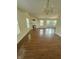 Open living space featuring a fireplace, hardwood floors, and large windows providing lots of natural light at 3350 Shore Dr, Greenwood, IN 46143