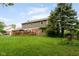 Home exterior shows a vast backyard with a deck area perfect for outdoor activities and relaxation at 3439 Eden Park Dr, Carmel, IN 46033
