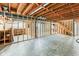 Unfinished basement featuring exposed ceiling, concrete floor, and wooden beams at 3439 Eden Park Dr, Carmel, IN 46033