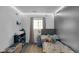 Well-lit bedroom features wood floors and a window for natural light at 3509 N Wittfield St, Indianapolis, IN 46235