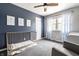 Charming Bedroom with a crib, neutral decor, and plenty of natural light, creating a calming space at 3715 Rolling Springs Dr, Carmel, IN 46033