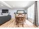 Comfortable living room with wood floors, sofas, coffee table, and stylish decor at 3715 Rolling Springs Dr, Carmel, IN 46033