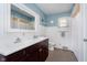 Charming bathroom features a double vanity, and a shower tub at 3740 Cheviot Pl, Indianapolis, IN 46205