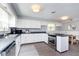 Bright kitchen with sleek countertops, stainless steel appliances, and modern white cabinetry at 3740 Cheviot Pl, Indianapolis, IN 46205