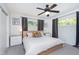 Comfortable main bedroom features a ceiling fan, and ample natural light at 3740 Cheviot Pl, Indianapolis, IN 46205