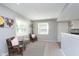 Cozy sitting area with windows and a view to other living spaces at 3740 Cheviot Pl, Indianapolis, IN 46205
