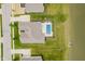 Bird's eye view of home with manicured backyard, swimming pool, and waterside neighborhood at 3821 Shady Lake Dr, Westfield, IN 46074