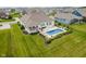 Beautiful backyard with an inviting in-ground pool and manicured landscaping at 3821 Shady Lake Dr, Westfield, IN 46074
