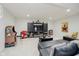 Finished basement with a comfortable seating area and an entertainment center at 3821 Shady Lake Dr, Westfield, IN 46074