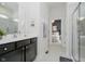 This bathroom features a glass shower and a dual sink vanity at 3821 Shady Lake Dr, Westfield, IN 46074
